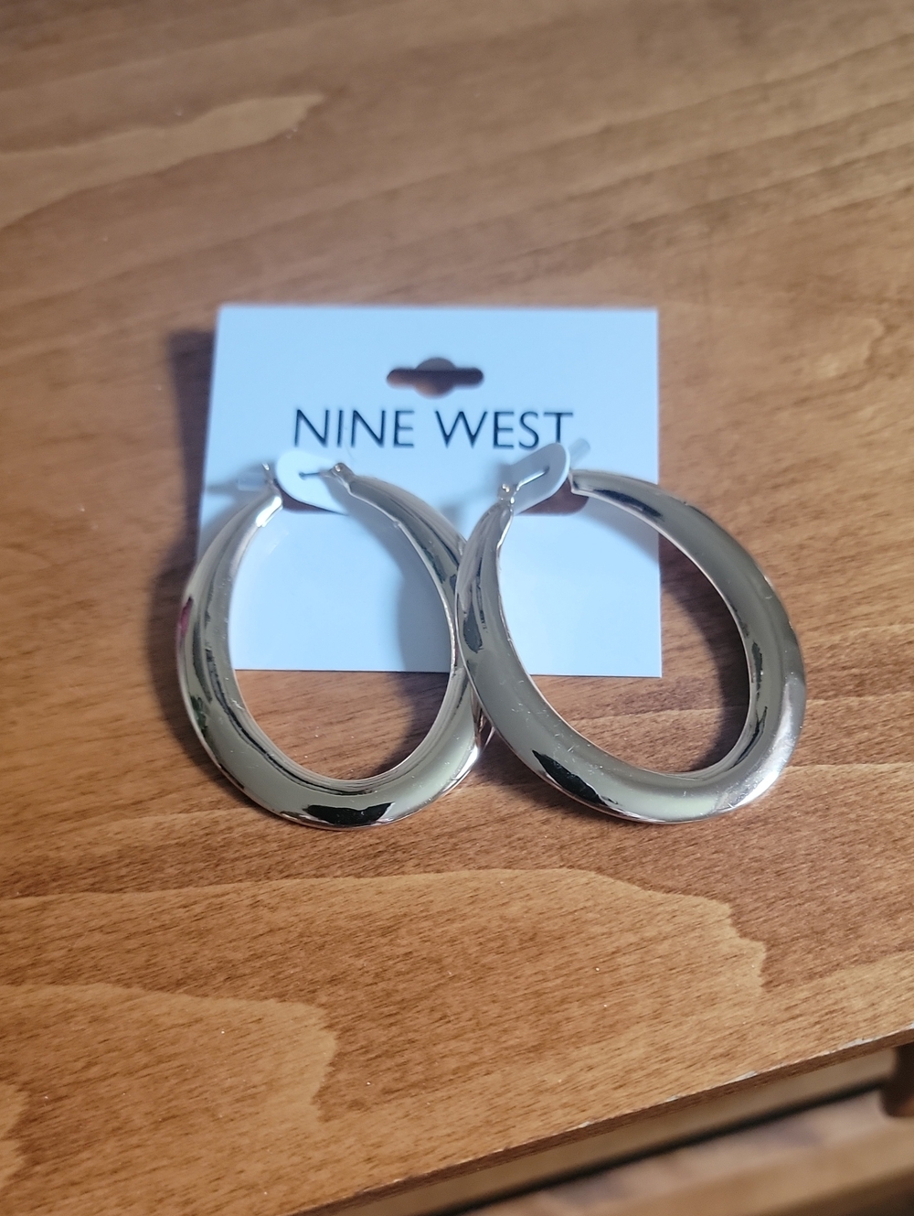 Nine West Polished Silver Oval Hoop Earrings